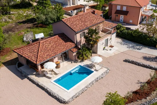 BookNoFees holiday home in Malinska – A stone villa with a swimming pool and a sauna