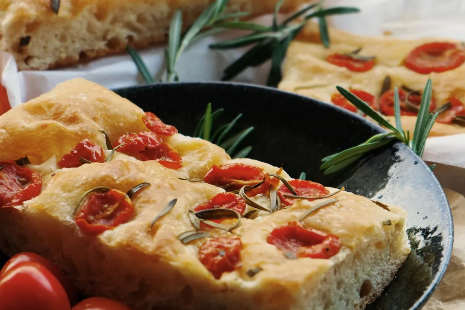 BookNoFees: Example photo: Focaccia topped with tomatoes and rosemary